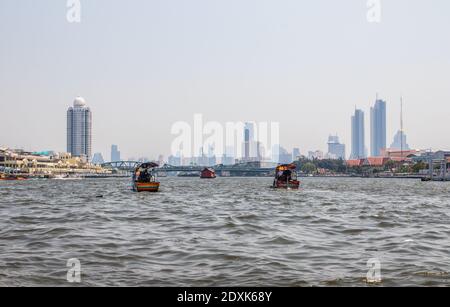 Bangkok Thailand Southeast Asia Boat traffic on the Chao Phraya River Stock Photo