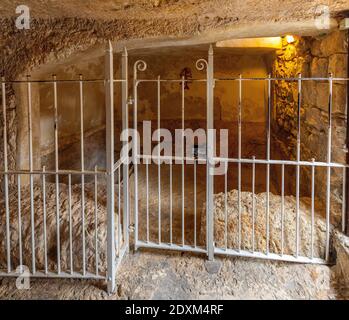 Jerusalem, Israel - October 14, 2017: Burial chamber Interior of Garden Tomb considered as place of burial and resurrection of Jesus Christ Stock Photo