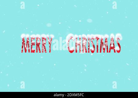 On a blue snow background text Merry Christmas Stock Photo