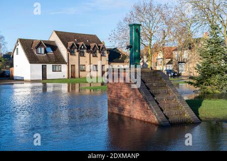 Willingham Cambridgeshire, UK. 24th Dec, 2020. Many areas of the village are underwater today after heavy and persistent rain yesterday. Flooding affected low lying areas and where drainage systems failed to cope with the large volume of water. Credit: Julian Eales/Alamy Live News Stock Photo