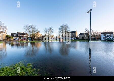 Willingham Cambridgeshire, UK. 24th Dec, 2020. Many areas of the village are underwater today after heavy and persistent rain yesterday. Flooding affected low lying areas and where drainage systems failed to cope with the large volume of water. Credit: Julian Eales/Alamy Live News Stock Photo