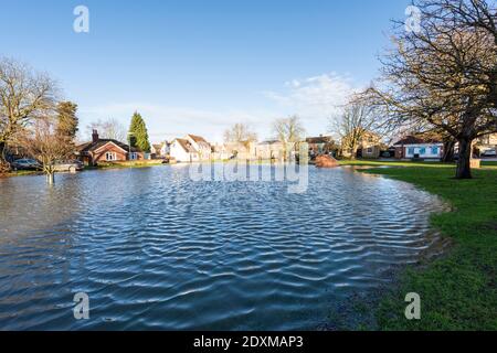 Willingham Cambridgeshire, UK. 24th Dec, 2020. Many areas of the village are underwater today after heavy and persistent rain yesterday. Flooding affected low lying areas and where drainage systems failed to cope with the large volume of water. Credit: Julian Eales/Alamy Live News Stock Photo