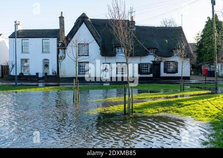 Willingham Cambridgeshire, UK. 24th Dec, 2020. Many areas of the village are underwater today after heavy and persistent rain yesterday. Flooding affected low lying areas and where drainage systems failed to cope with the large volume of water. Credit: Julian Eales/Alamy Live News Stock Photo