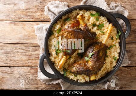 Haneeth is a traditional Yemeni dish also trendy in the rest of the Arabian Peninsula closeup on the table. horizontal top view from above Stock Photo