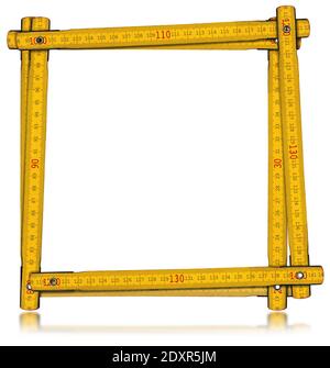 Yellow old wooden folding ruler in the shape of a square, meter, isolated on white background with reflections.