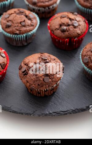 Chocolate muffin. muffin or cup cake with chocolate sprinkles. vertical view. Close-up. Stock Photo