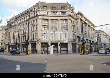 A view of a deserted Oxford Circus, as shops and businesses close once again. London has been placed under Tier 4 restrictions as cases surge and new strains of COVID-19 emerge in England. Stock Photo