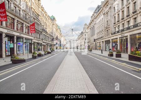A view of a deserted Regent Street, as shops and businesses close once again. London has been placed under Tier 4 restrictions as cases surge and new strains of COVID-19 emerge in England.