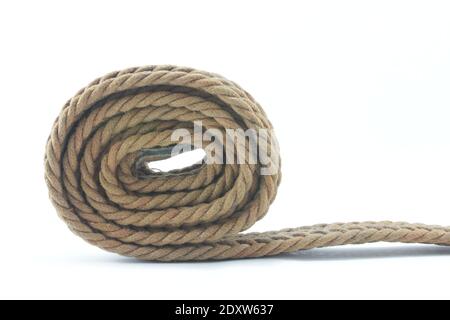 Close-up Of Rolled Rope Against White Background