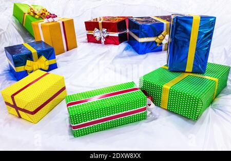 colorful gift boxes on stilized snow Stock Photo