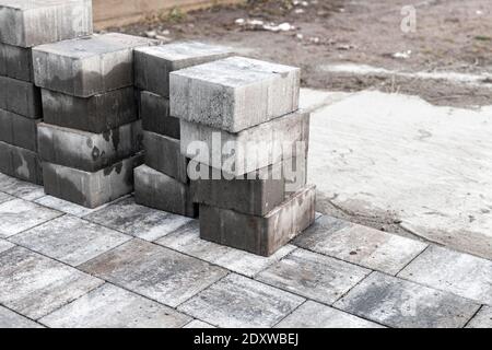 New gray paving slabs, background photo with selective focus Stock Photo