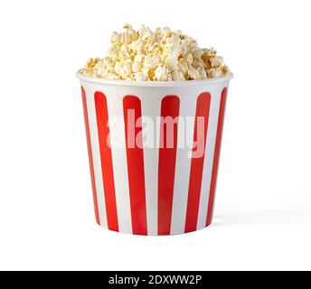 Popcorn in red and white striped cardboard bucket isolated on white background with clipping path Stock Photo