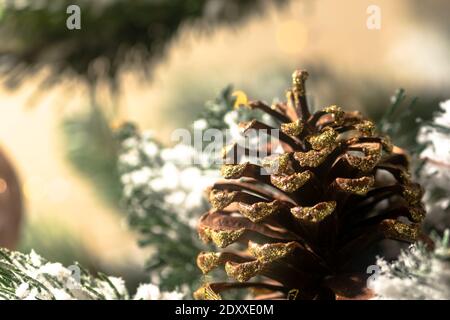 Christmas tree with pine cone holiday concept with copy space, selective focus. Stock Photo