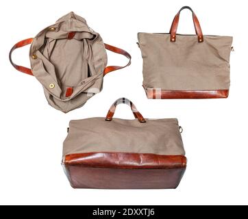 set of handcrafted travel handbag made from leather and canvas tarp isolated on white background Stock Photo