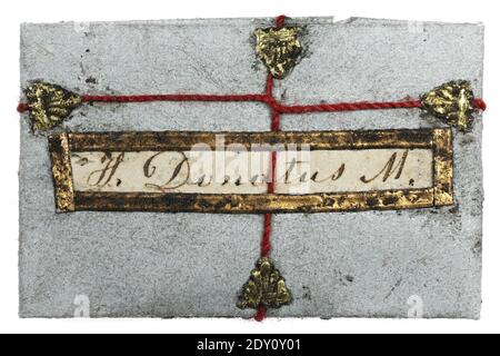 folded paper relic to Saint Donatus isolated on white background Stock Photo