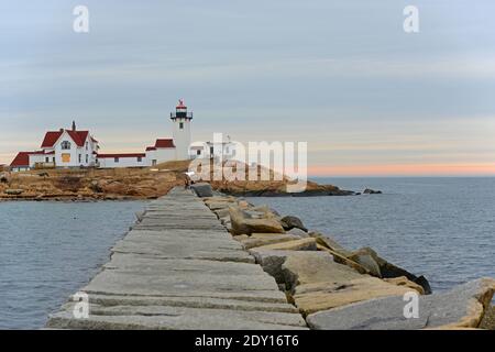 Eastern Point Lighthouse at sunset, Cape Ann, northeastern Massachusetts MA, USA. This historic lighthouse was built in 1832 on the Gloucester Harbor Stock Photo