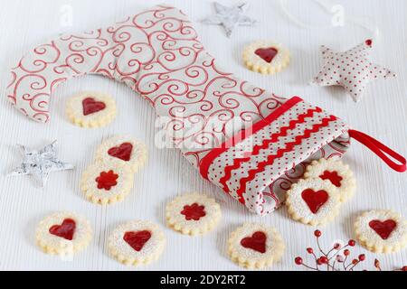 christmas biscuits Spitzbuben and Santa Claus stocking Stock Photo