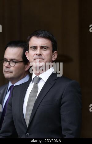 Prime Minister Manuel Valls, flanked by commander of L'Hermione Yves ...