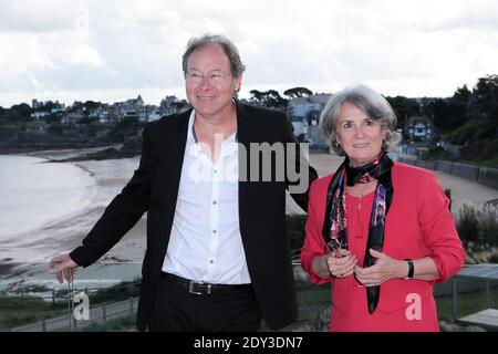 festival director hussam hindi and mayor of dinard martine craveia schutz posing for the photocall of the jury during the 25th british film festival of dinard during held at thalassa in dinard france on october 11 2014 photo by audrey poreeabacapress 2dy3dn7