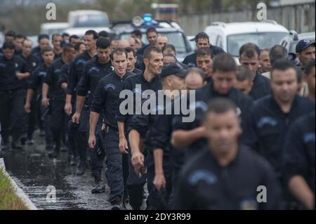 Policemen take part in a public protest on October 14, 2014 in Algiers, Algeria, in support with a police demonstration over working conditions and riots in the southern city of Ghardaia. According to al-Watan newspaper, 1500 policemen took part in the demonstration on October 13, 2014 in Ghardaia where clashes have been taking place for months between Arabs and Berbers. Photo by Ammi Louiza/ABACAPRESS.COM Stock Photo