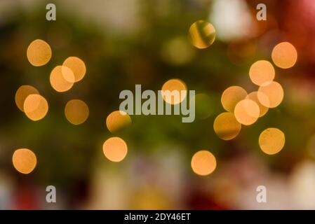 Blurred Christmas bokeh lights. Abstract holiday background. Stock Photo
