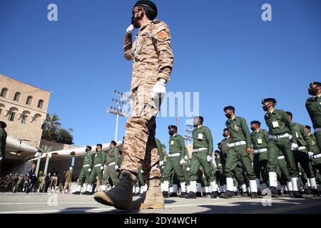 Tripoli, Dec. 24 this year marks the 69th anniversary of the independence of Libya. 24th Dec, 2021. Libyan soldiers participate in a parade during the celebration of the Independence Day in Tripoli, Libya, on Dec. 24, 2020. Dec. 24 this year marks the 69th anniversary of the independence of Libya, as Libyans hope to achieve stability and unity of their politically divided country with the elections scheduled for Dec. 24, 2021. Credit: Hamza Turkia/Xinhua/Alamy Live News Stock Photo