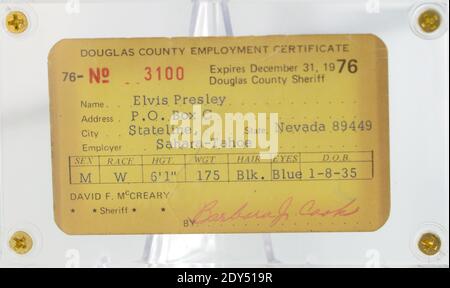 2014 Icons and Idols Rock’n Roll auction at Julien's Auctions Beverly Hills, Los Angeles, CA, USA, November 3, 2014. The auction will be held on November 6th and 7th. Elvis Presley ID with fingerprint. $4,000-6,000. Photo by Lionel Hahn/ABACAPRESS.COM