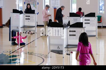 Voters fill out their ballot at a polling station during the mid-term elections November 4, 2014 in North East, Washington DC, USA. Today Americans head to the polls to cast their vote in the mid-term elections, which will decide whether Republicans or Democrats will control the Senate. Photo by Olivier Douliery/ABACAPRESS.COM Stock Photo