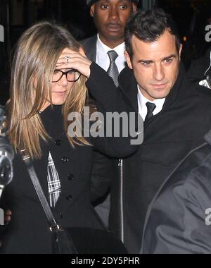 File photo - Actress Jennifer Aniston with her fiance Justin Theroux leaves the after party of her screening The Cake at the Jimmy in Soho, New York City, NY, USA, on November 16, 2014. Hollywood couple Jennifer Aniston and Justin Theroux are separating after two years of marriage. The pair, who reportedly met on the set of comedy film Wanderlust, said the mutual decision was 'lovingly made' at the end of last year. Photo by Charles Guerin-Morgan Dessalles/ABACAPRESS.COM Stock Photo