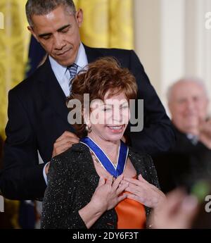 US President Barack Obama presents the Medal of Freedom to author Isabel Allende during a ceremony in the East Room of the White House in Washington, DC, USA, on November 24, 2014. The Medal of Freedom is the country highest civilian honor. Photo by Olivier Douliery/ABACAPRESS.COM Stock Photo