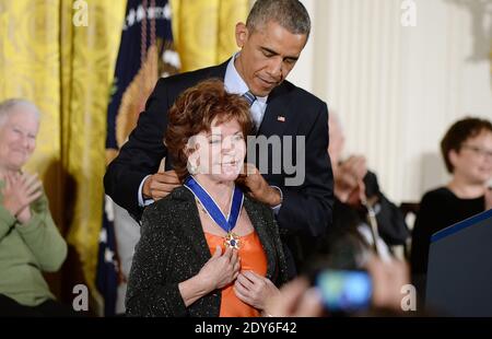 US President Barack Obama presents the Medal of Freedom to author Isabel Allende during a ceremony in the East Room of the White House in Washington, DC, USA, on November 24, 2014. The Medal of Freedom is the country highest civilian honor. Photo by Olivier Douliery/ABACAPRESS.COM Stock Photo