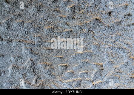 a texture of a wall worked in relief Stock Photo