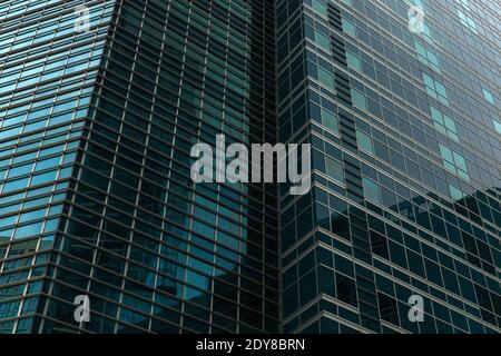 Contemporary architecture background, glass building walls and corners with reflections and shadows, Moscow 28.06.2020 Stock Photo