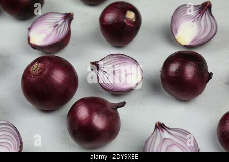 sweet red onions on background Stock Photo