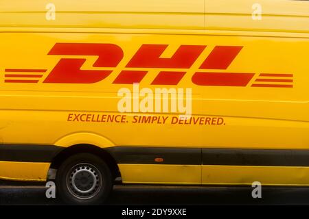 London, UK. 23rd Dec, 2020. A DHL delivery van seen parked on the road in London. Credit: SOPA Images Limited/Alamy Live News Stock Photo