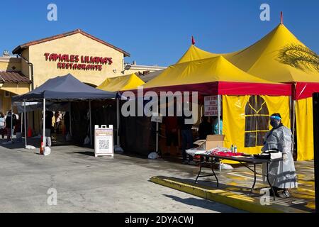 A take out line at the Tamales Liliana's Restaurante amid he global coronavirus COVID019 pandemic, Tuesday, Dec. 22, 2020, in Los Angeles. Stock Photo