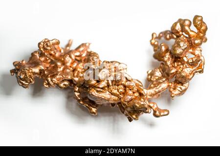 Close-up view of a native copper resemble like a dragon isolated on the white background. Stock Photo
