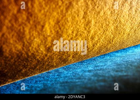 Orange and teal abstract background, made from photogrph from two thick paper sheets Stock Photo