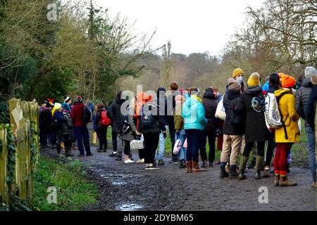Large queue with no social distancing at Hampstead Men’s Pond for Annual Christmas swimming event Christmas Day 2020. Stock Photo