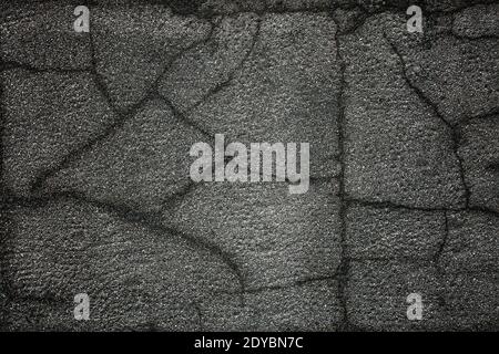 The texture of a gray concrete wall with cracks Stock Photo