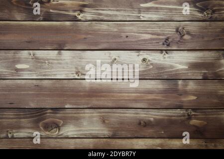 View on old vintage natural wooden brown board with horizontal lines of planks and knotholes Stock Photo