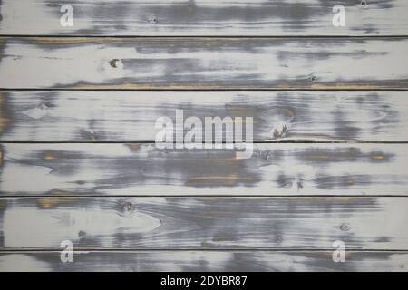 View on old vintage natural wooden retro white painted board with horizontal lines of planks and knotholes Stock Photo
