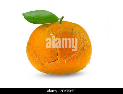 Orange citrus peel piece of stapled together on isolated white background Stock Photo