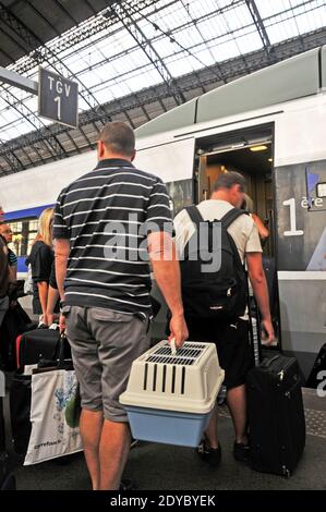 travellers boarding a TGV train in Bordeaux Saint-Jean railway station, Gironde, Nouvelle Aquitaine, France Stock Photo