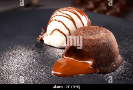 Petit gateau dessert - Traditional Sweet - Chocolate cake with ice cream Stock Photo