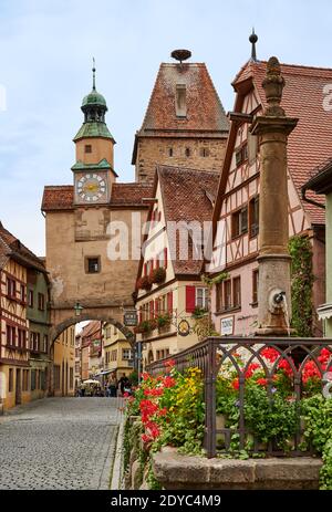 Markusturm, Roederbrunnen and Roederbogen in medieval town Rothenburg ob der Tauber, Bavaria, Germany Stock Photo