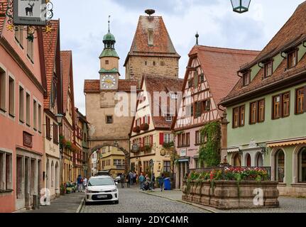 Markusturm, Roederbrunnen and Roederbogen in medieval town Rothenburg ob der Tauber, Bavaria, Germany Stock Photo