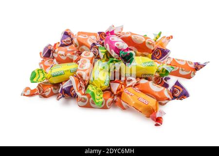 a pile of fruit candies, isolated on white background Stock Photo