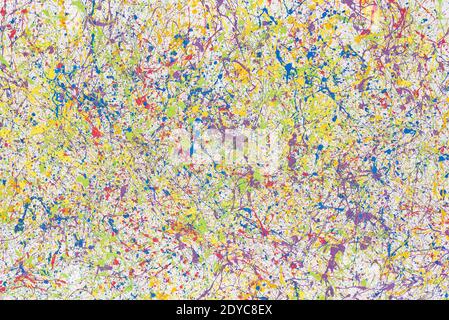 Multi-colored splashes of paint on the wall. Colored background. Stock Photo
