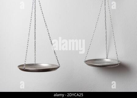 Silver mechanical golden weight scale on white background. Laboratory scales Stock Photo